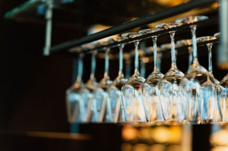 The Trick Bartenders Use to Clean Out Glass Bottles